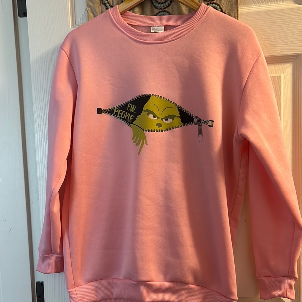 Pink Sweatshirt with Grinch Graphic